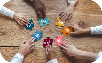 Employees participating in a puzzle game trying to solve it representing collaboration 